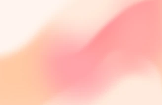 a blurry image of a pink and white background