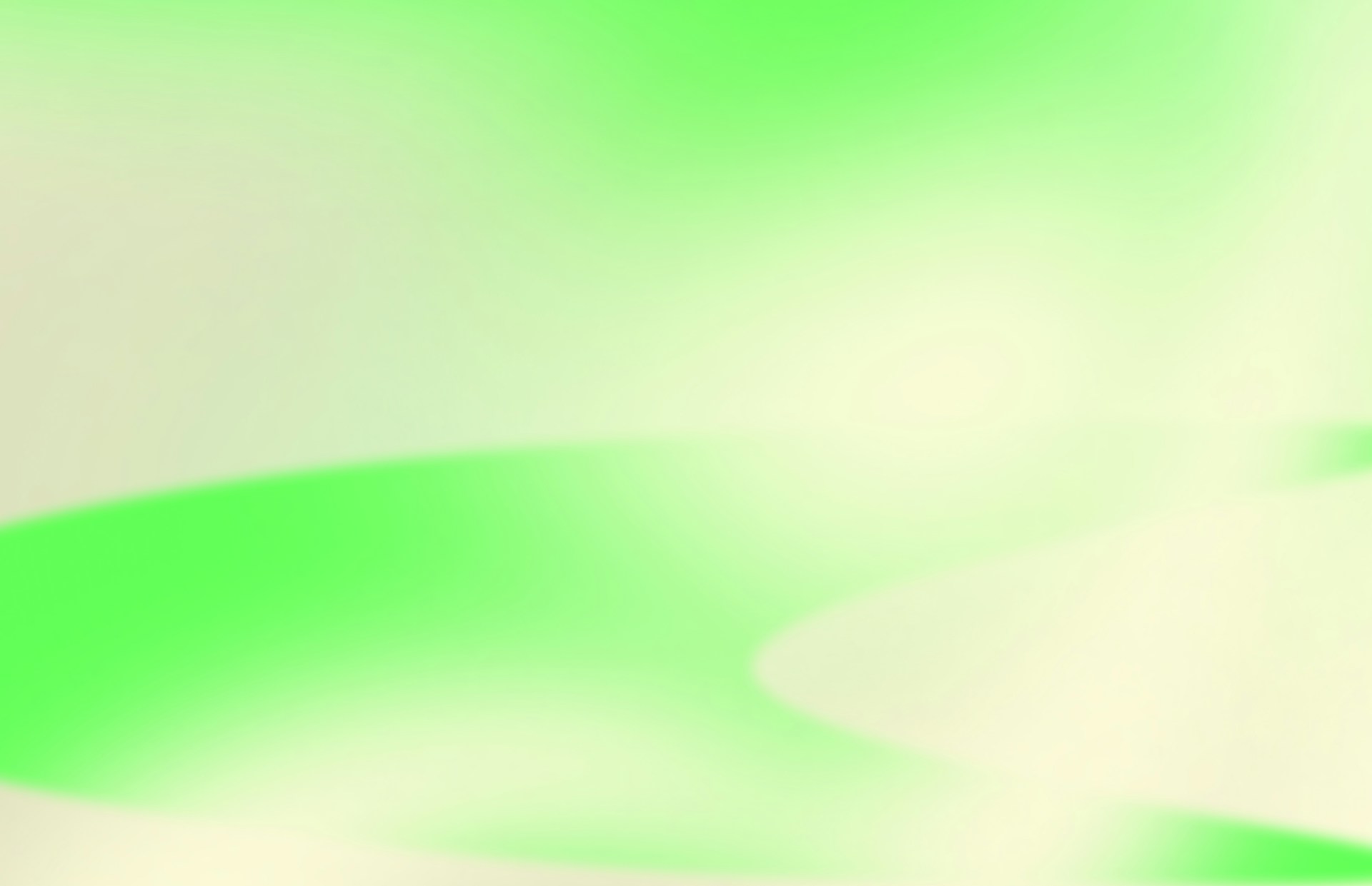a blurry image of a green and white background