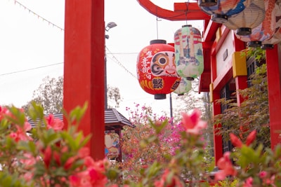 A vibrant photo of a traditional Japanese festival with colorful lanterns and smiling faces.