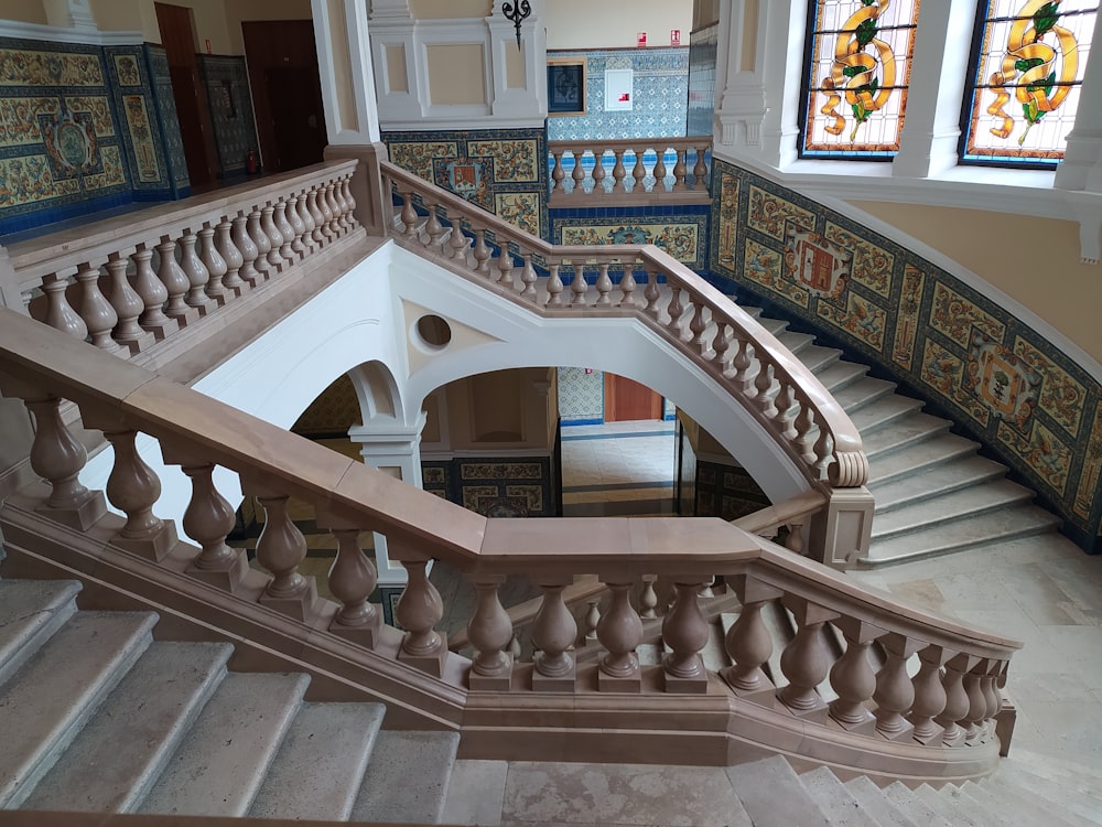 a view of a staircase from the top of the stairs