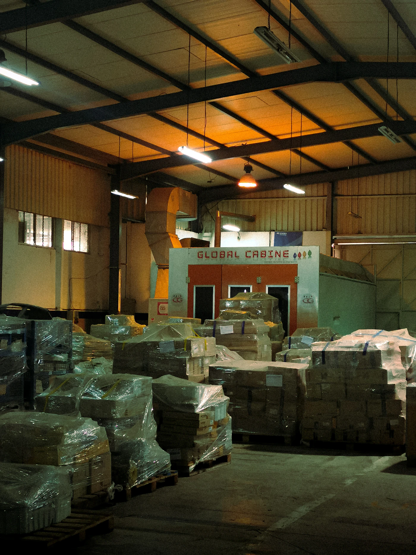 Illustrative warehouse pallets boxed vehicle parts stock