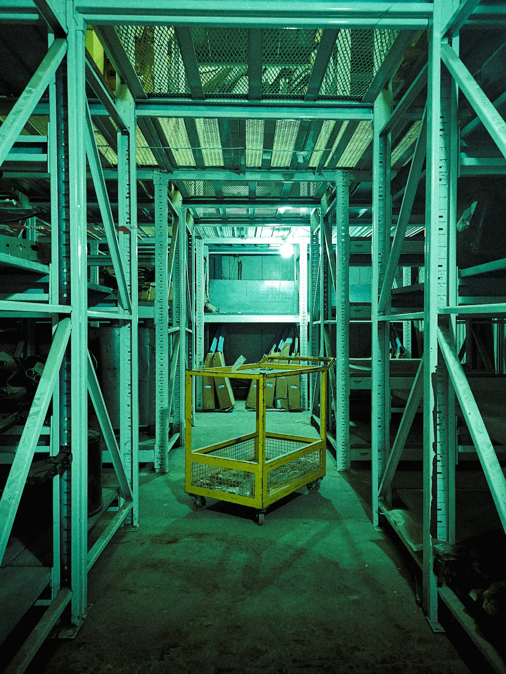 a room filled with lots of metal shelves