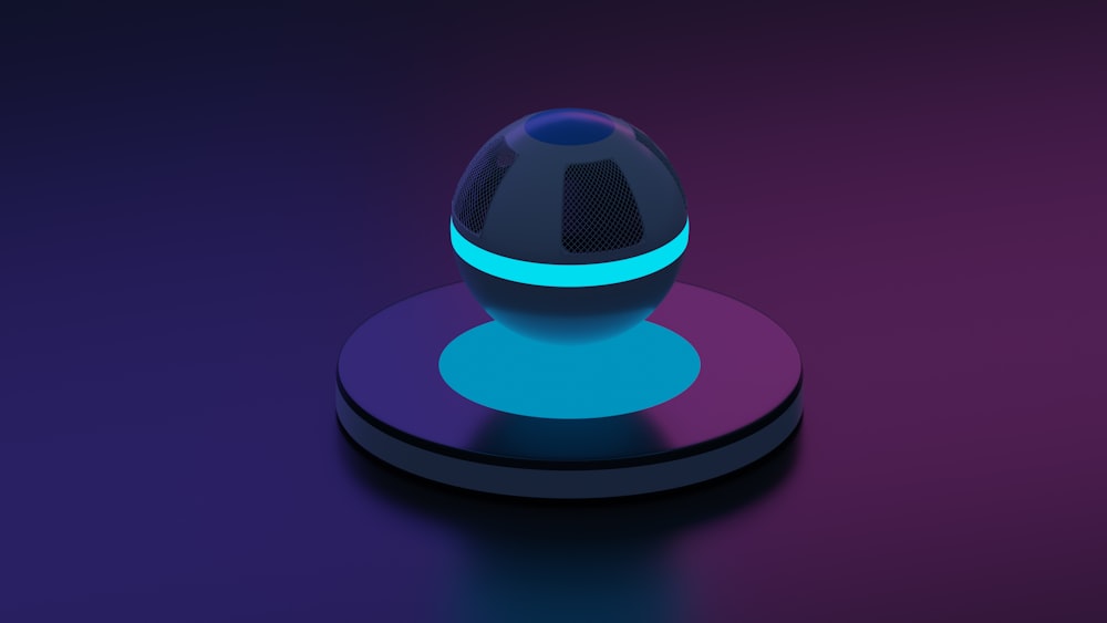 a blue and black object on a purple surface