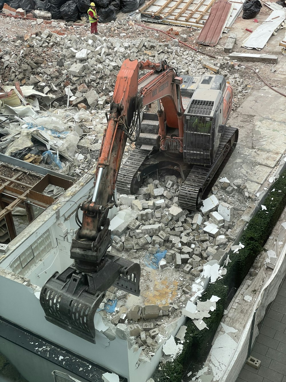a construction site with a large machine in the middle of it