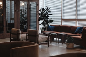 An elegant sectional sofa arranged in a stylish lounge area.