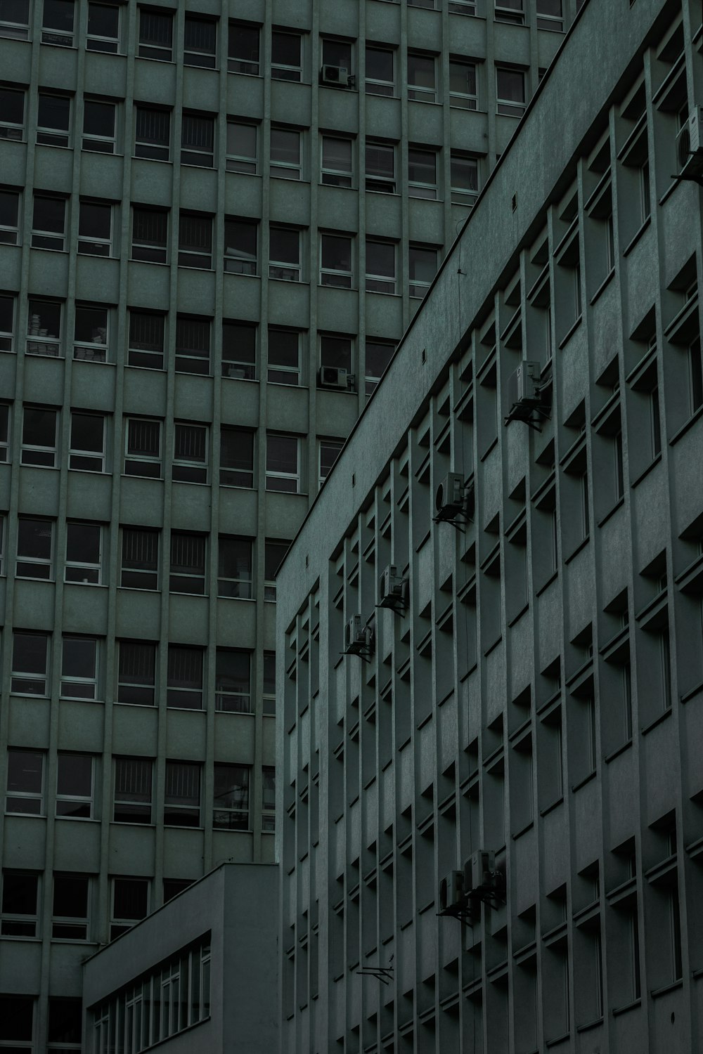 a tall building with a clock on the side of it