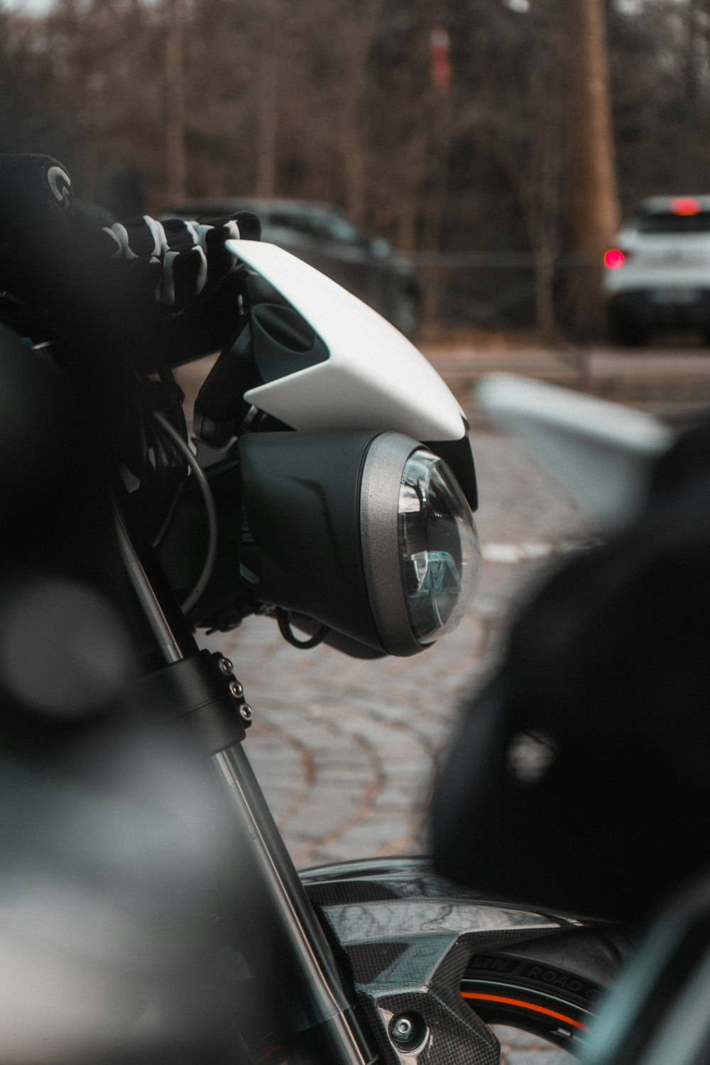a close up of a motorcycle with a camera attached to it