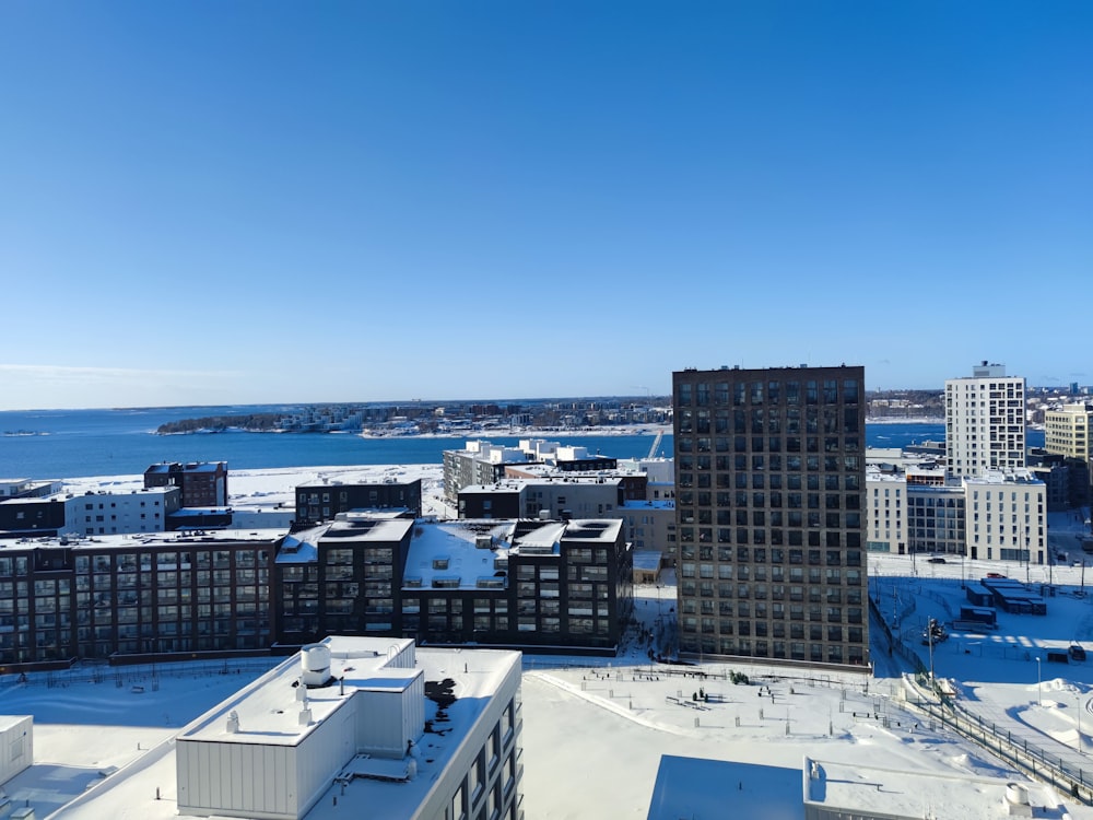 a view of a city with snow on the ground