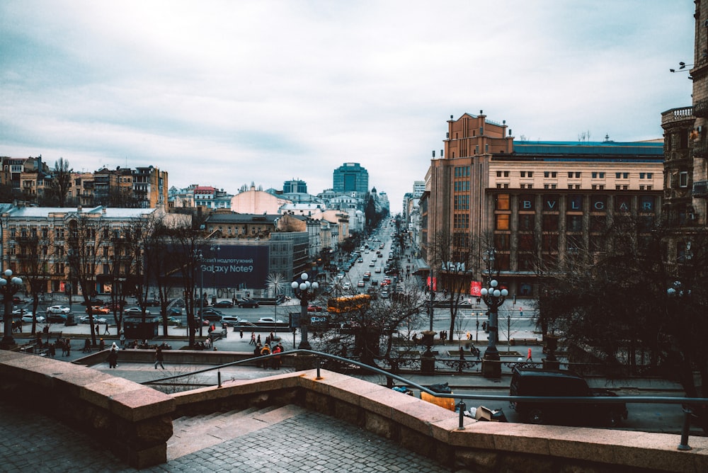 a view of a city street from a balcony