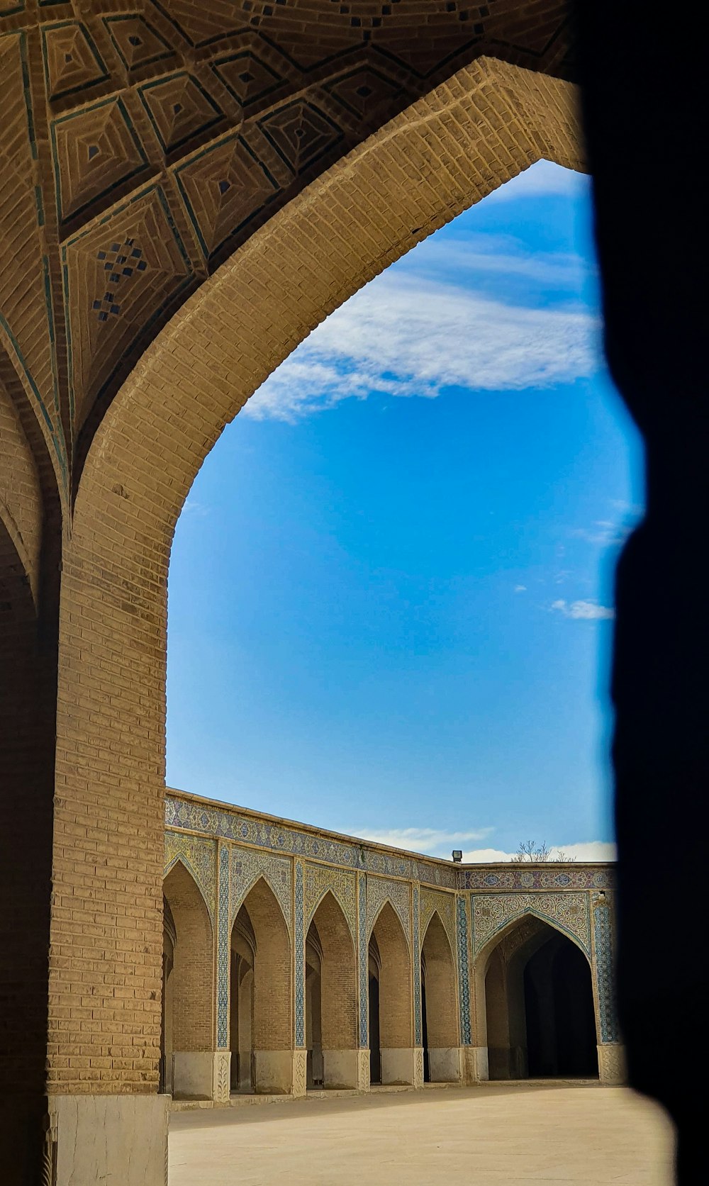 a view of a building through an archway