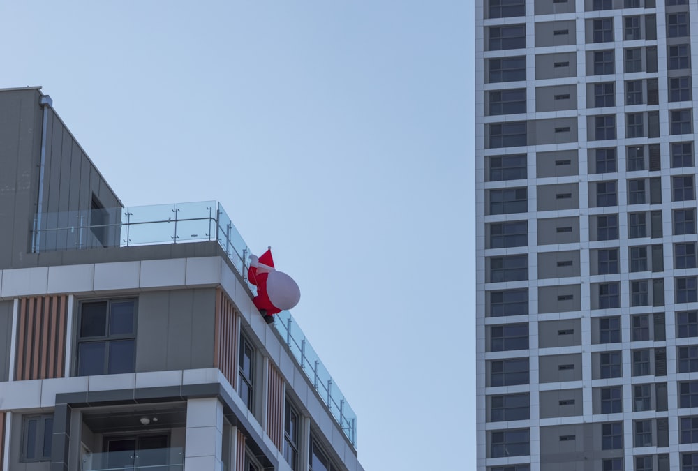 a canadian flag on top of a building