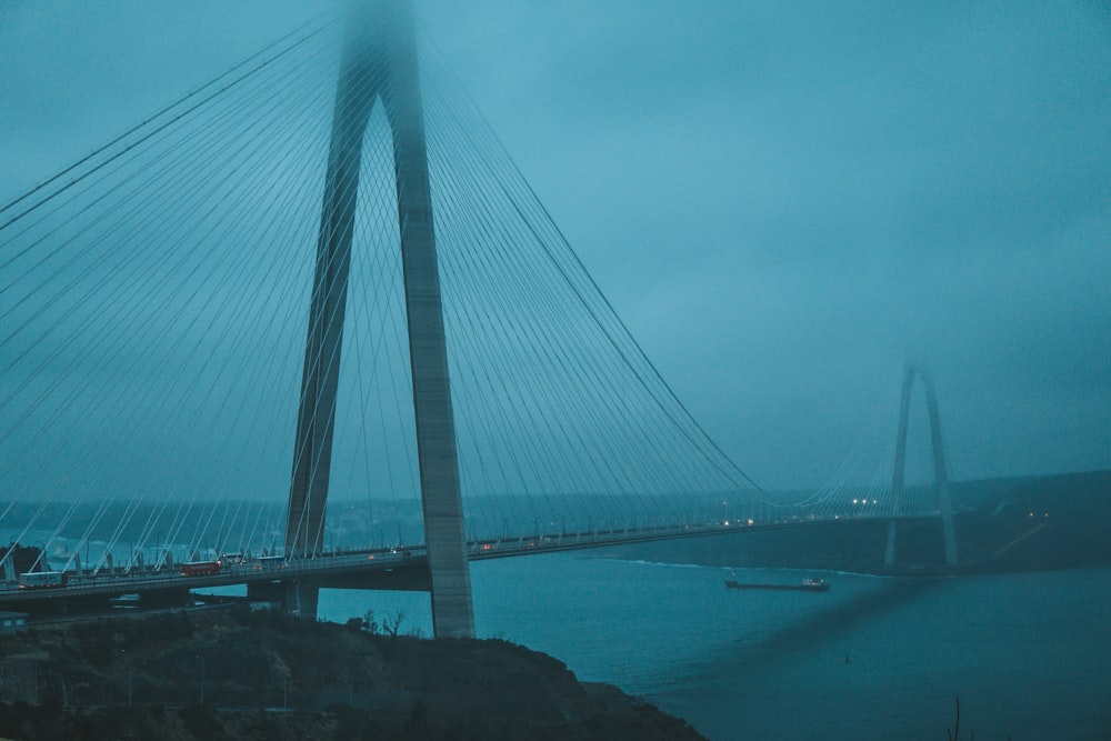 a very tall bridge over a large body of water