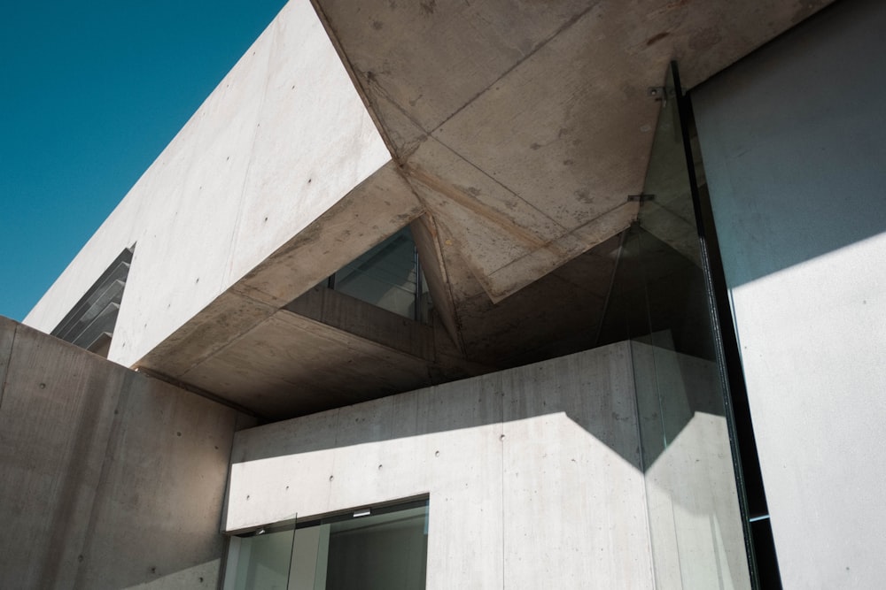 a concrete building with a sky background