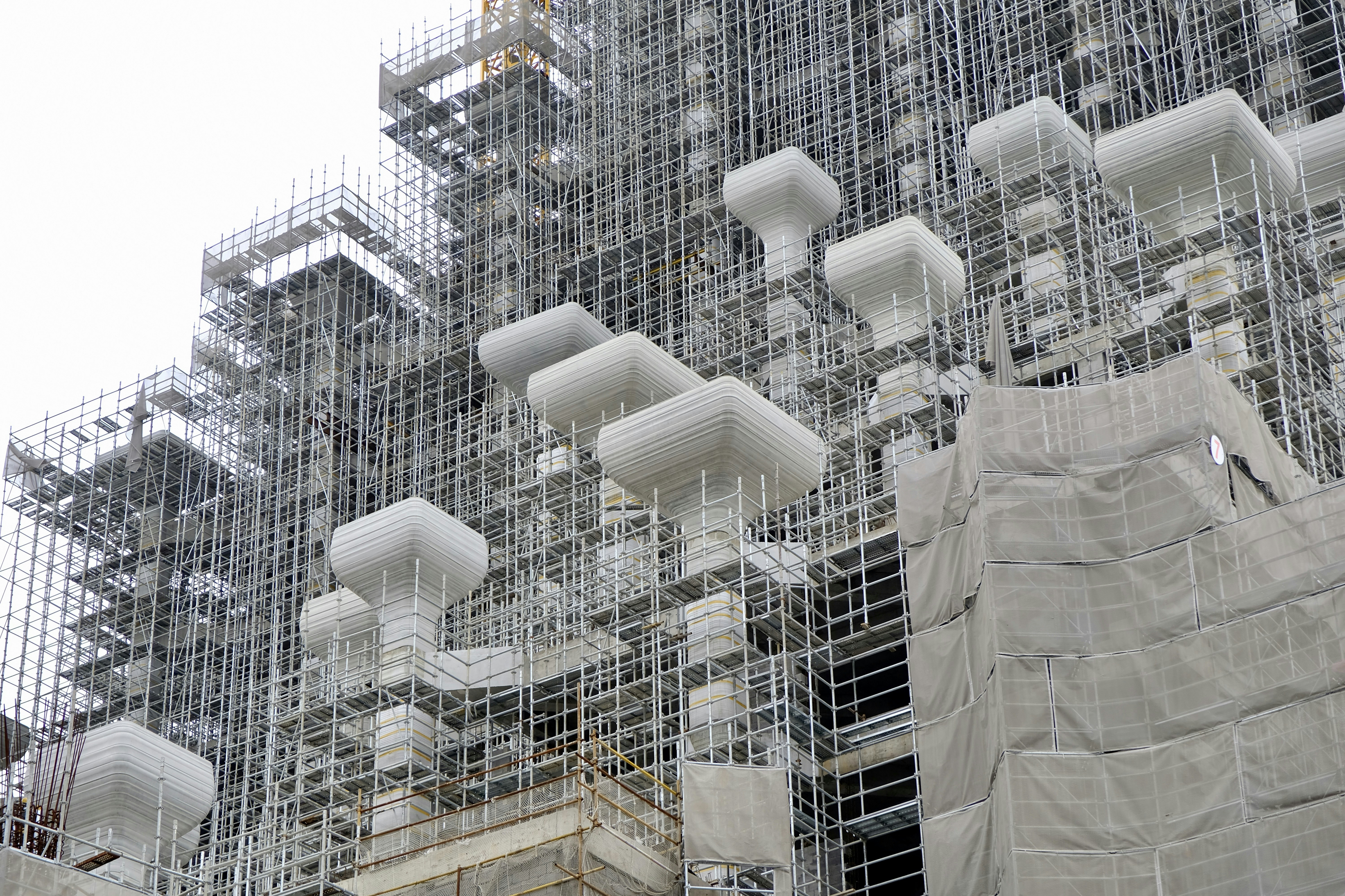 a bunch of pipes that are attached to a building