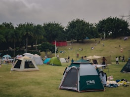 A dynamic event setup with people enjoying various activities.
