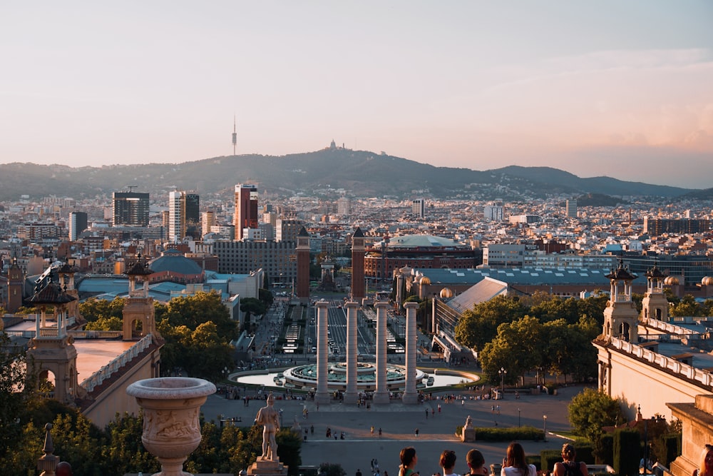 a view of a city with mountains in the background