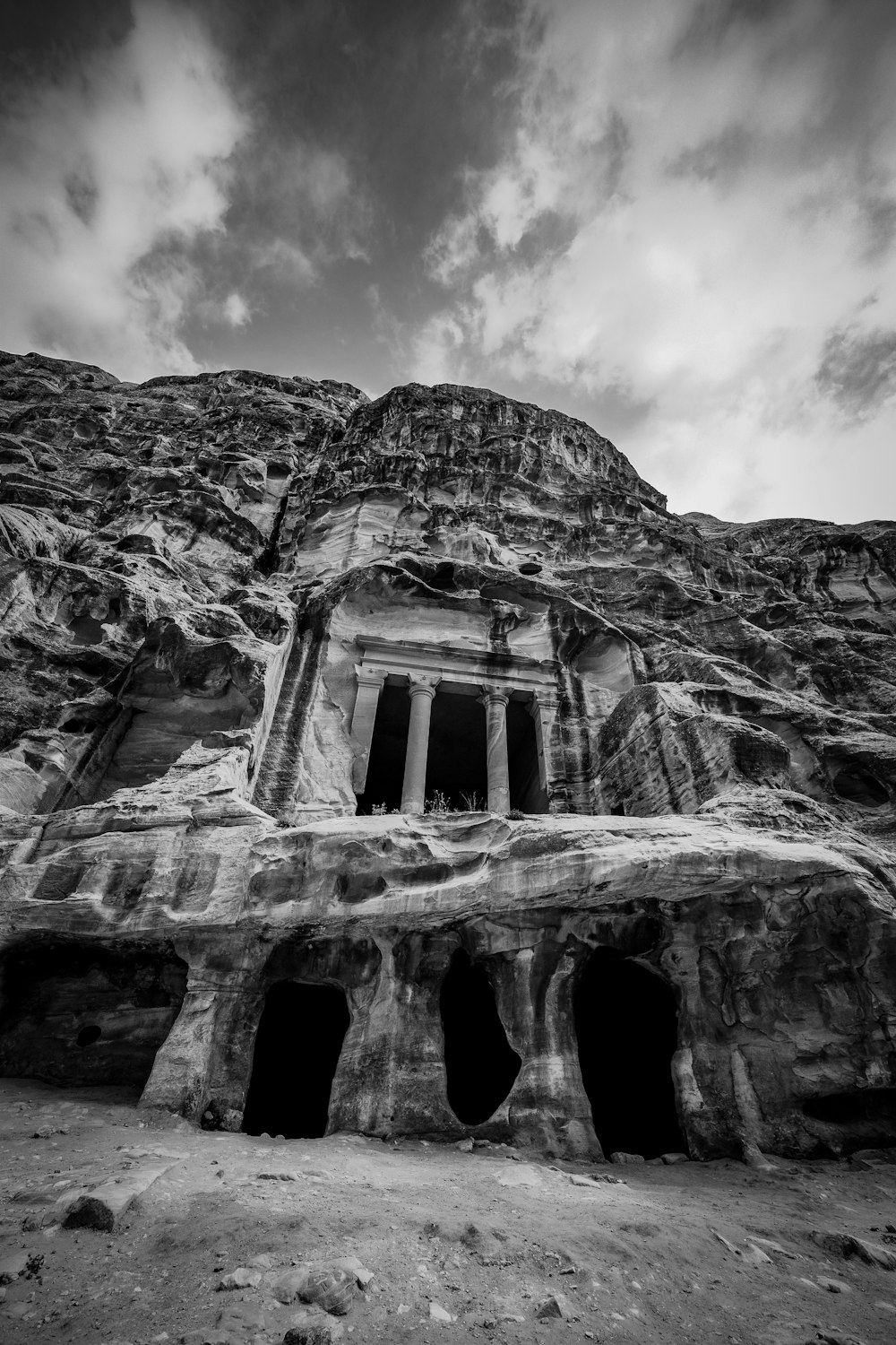 a black and white photo of a cave