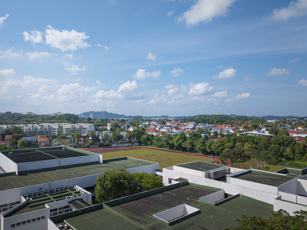 a view of a tennis court from a rooftop