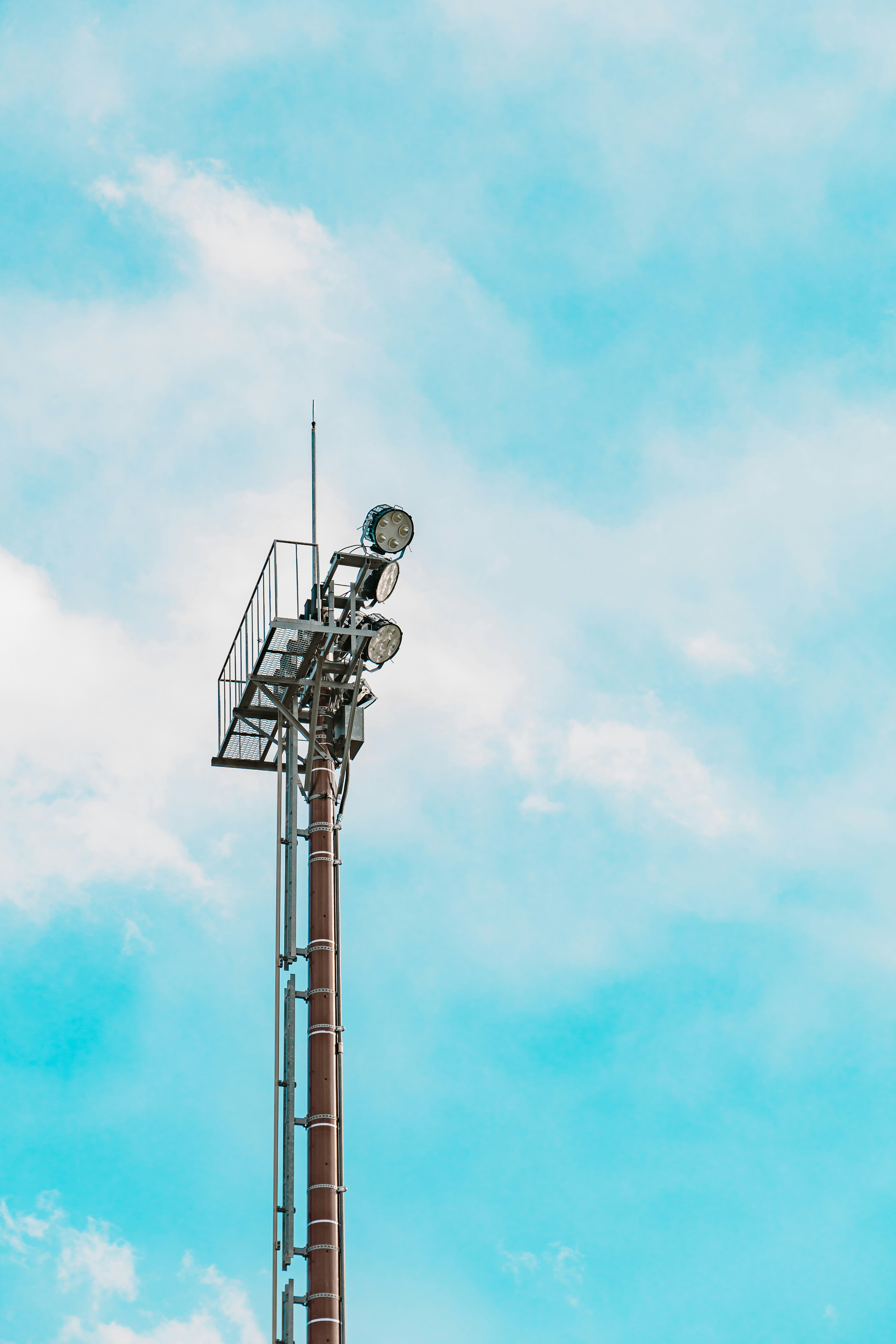 a tall tower with a light on top of it