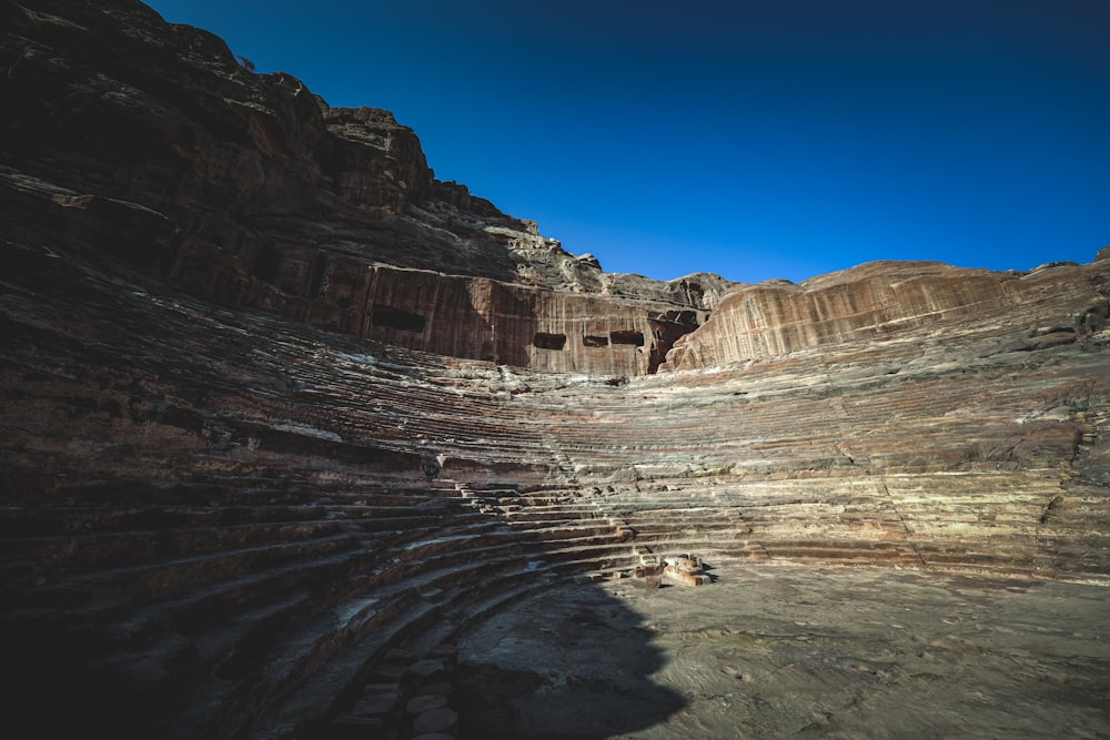 a narrow canyon with steps in the middle of it