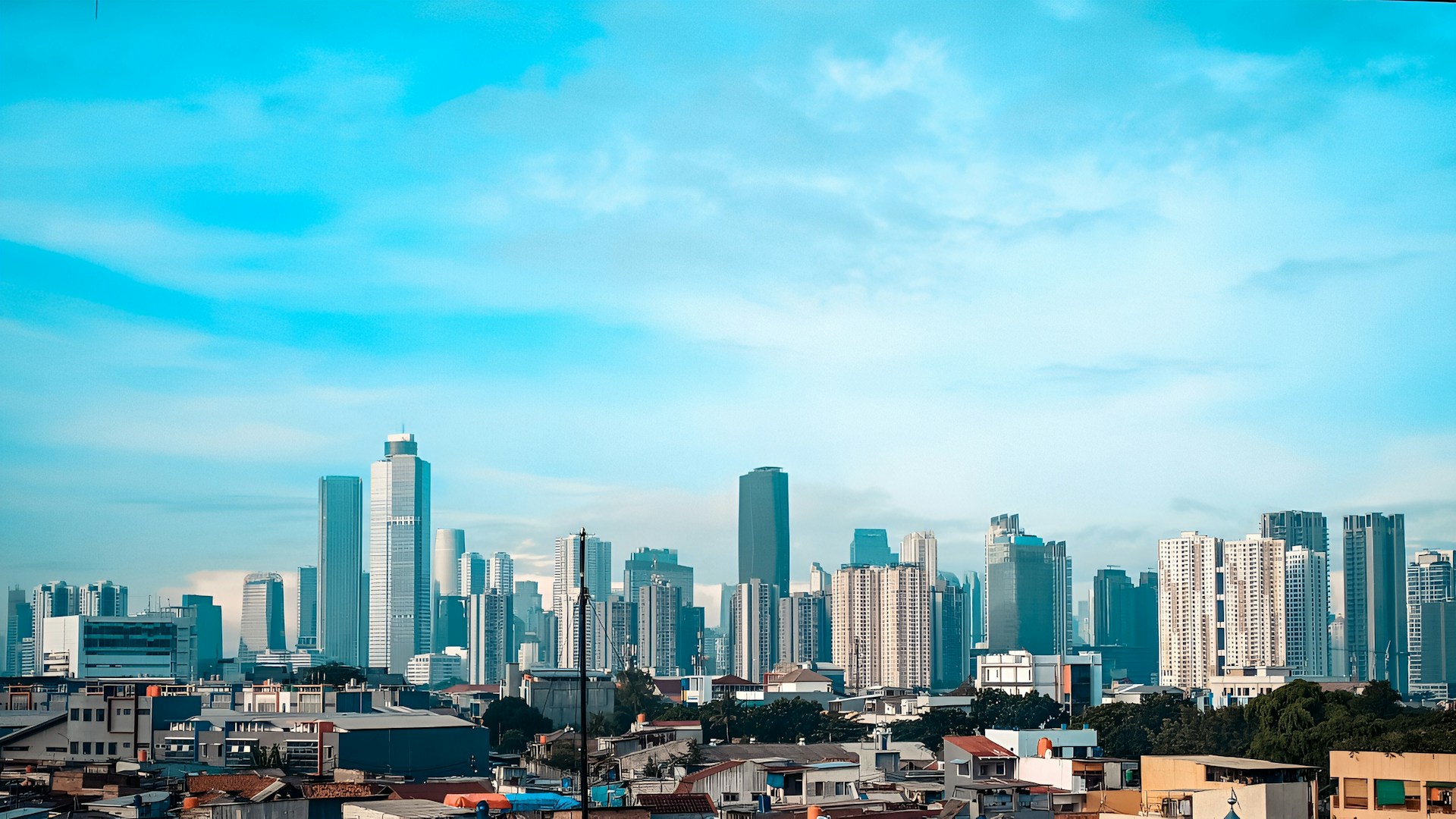 a view of a city with tall buildings