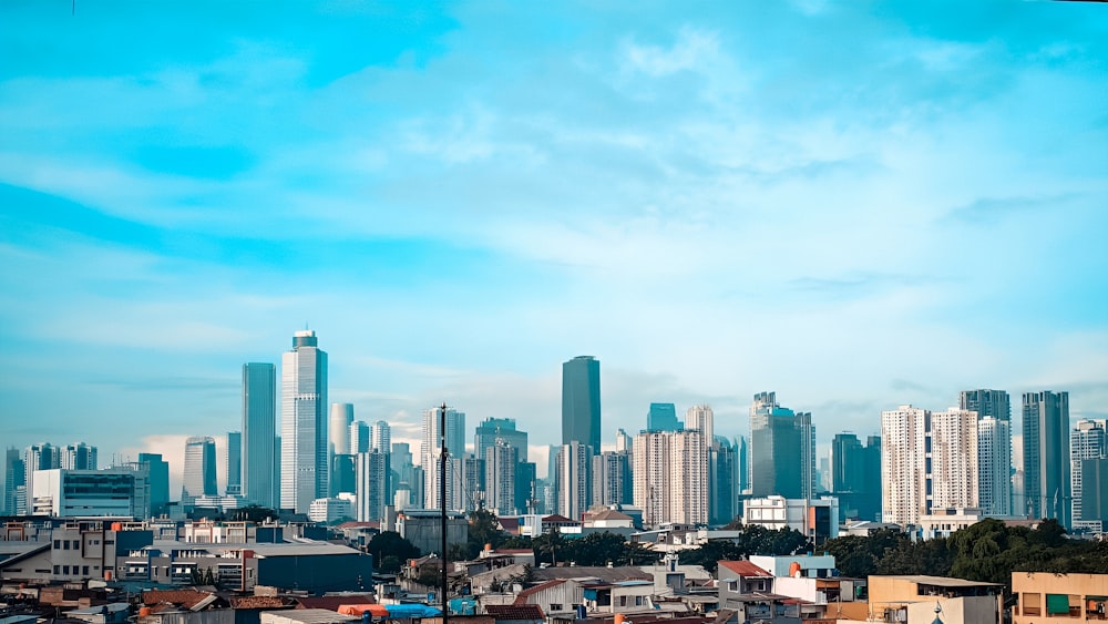 a view of a city with tall buildings