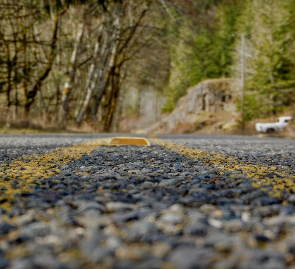 a road with a yellow line on the side of it