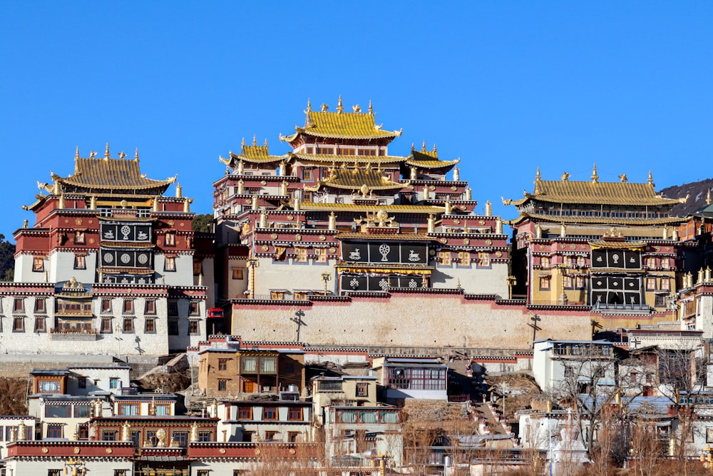 a group of buildings with a sky background