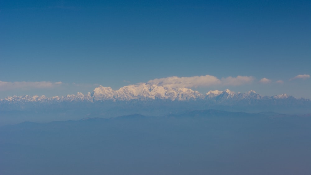 a view of a mountain range from an airplane