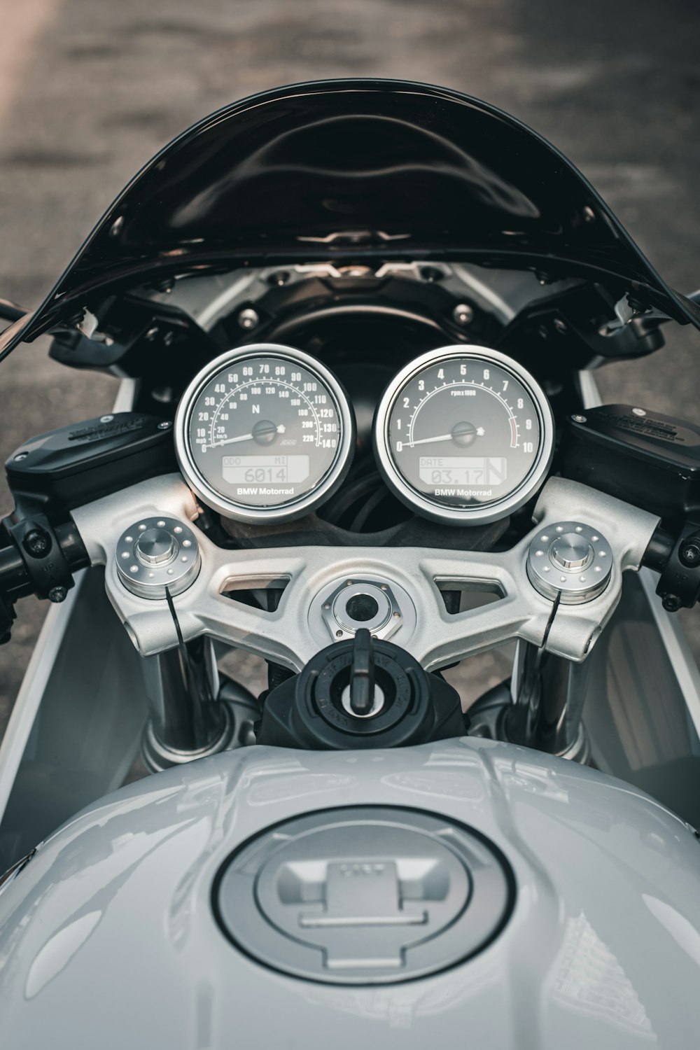 a close up of the gauges on a motorcycle