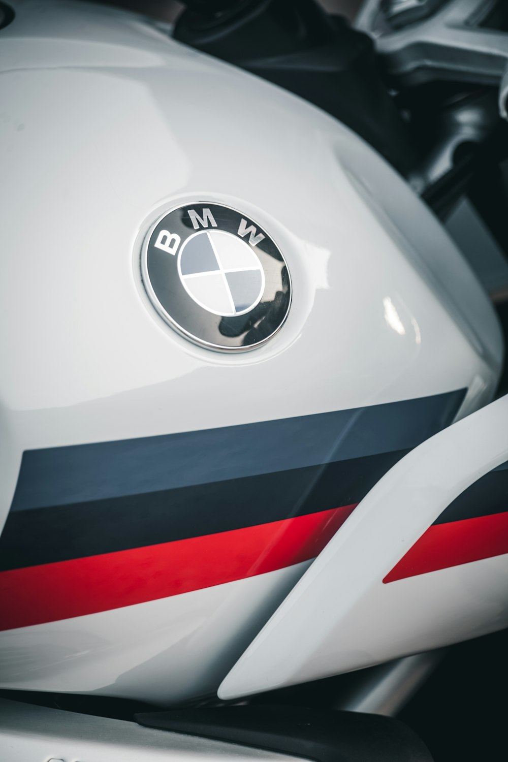 a close up of the bmw logo on a motorcycle