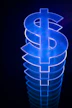 a lit up dollar sign sitting on top of a table