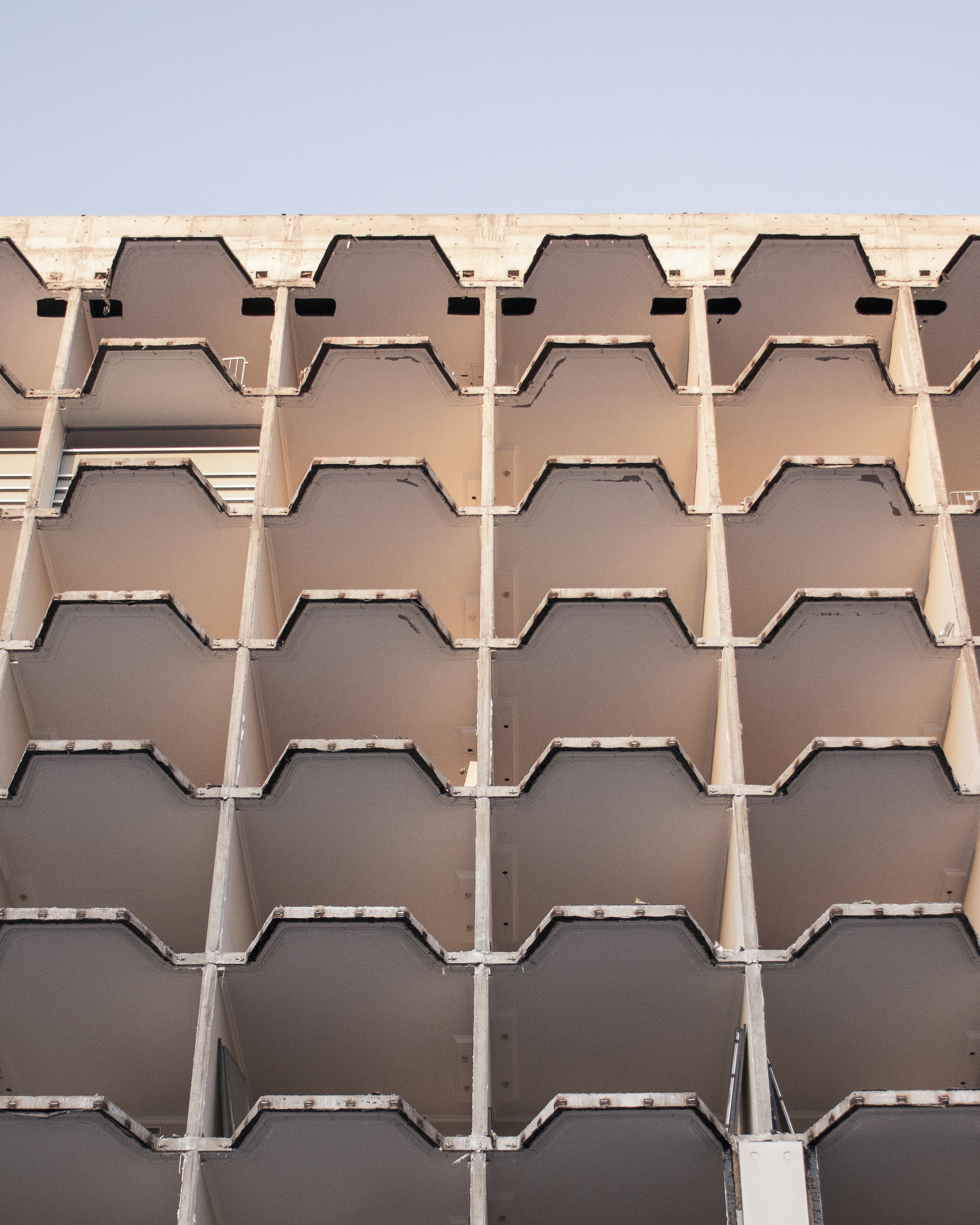 a tall building with lots of windows on the side of it