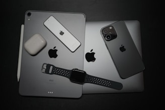 a couple of ipads sitting next to each other