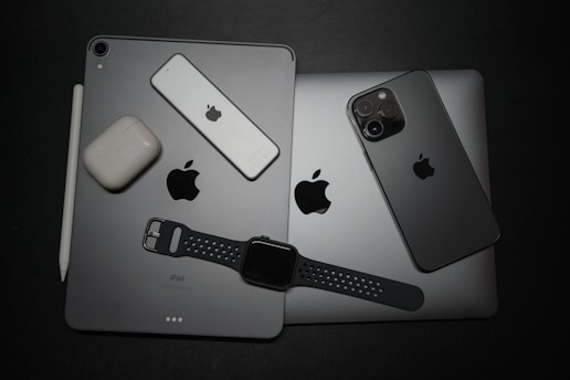 a couple of ipads sitting next to each other