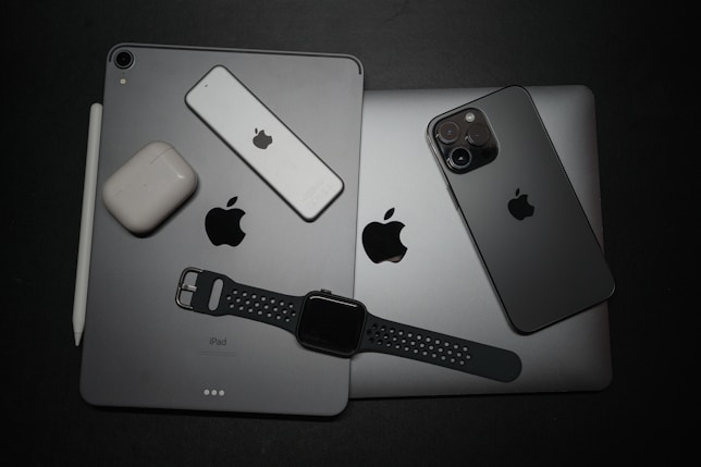a couple of ipads sitting next to each other