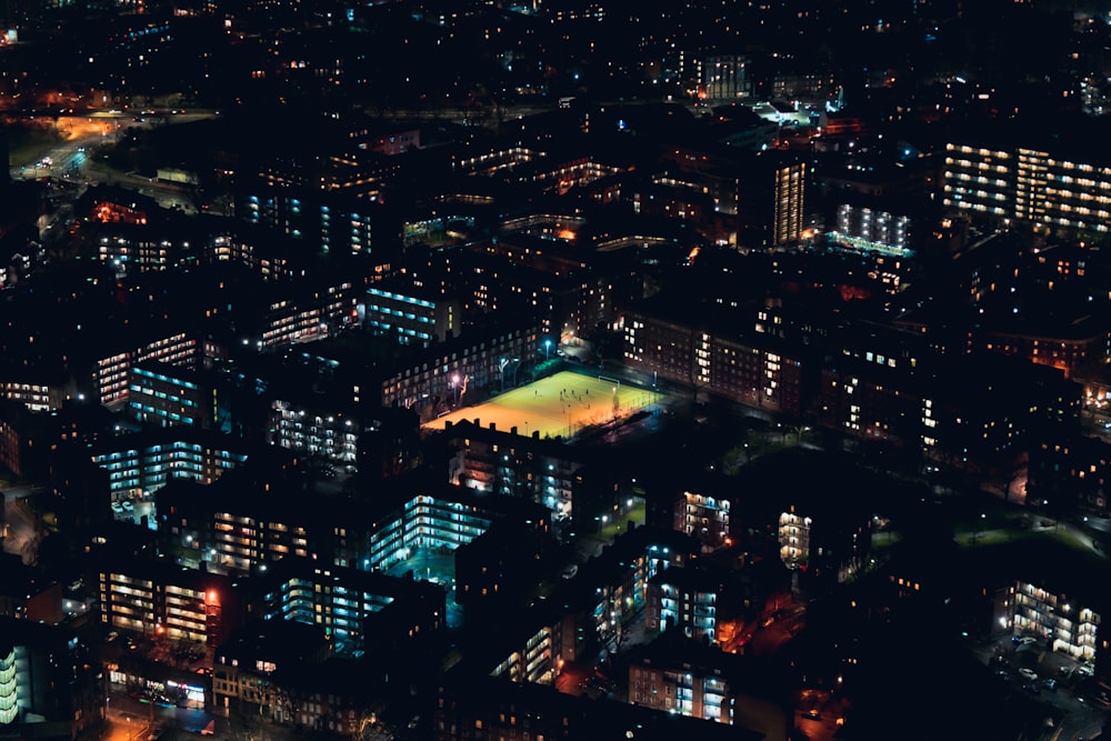 an aerial view of a city at night