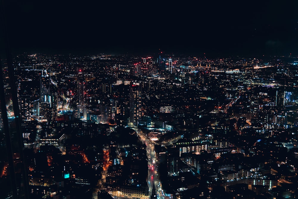 an aerial view of a city at night