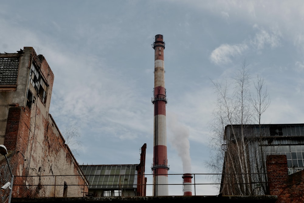 a factory with smoke coming out of it's stacks