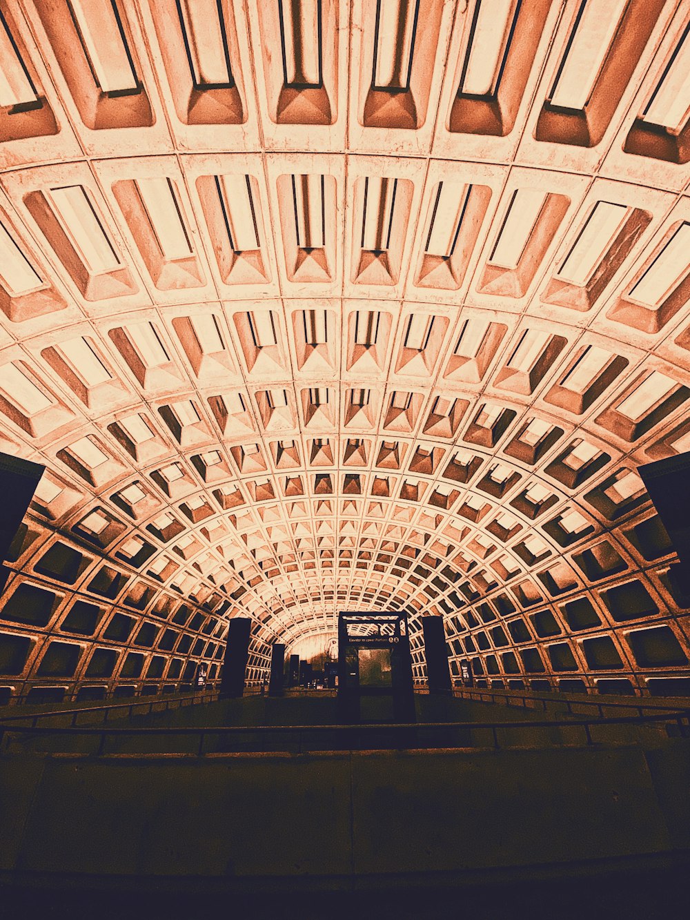 a view of the ceiling of a building from below