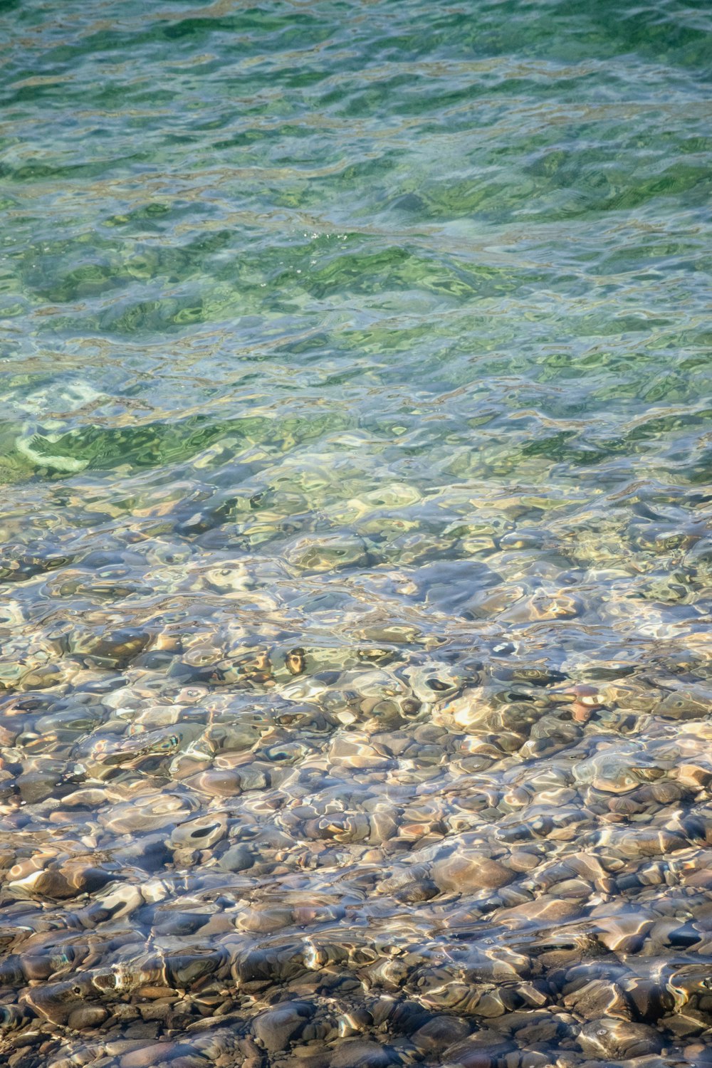 a bunch of rocks that are in the water