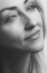 A minimalist black and white portrait of Alex reflecting calm and focus.