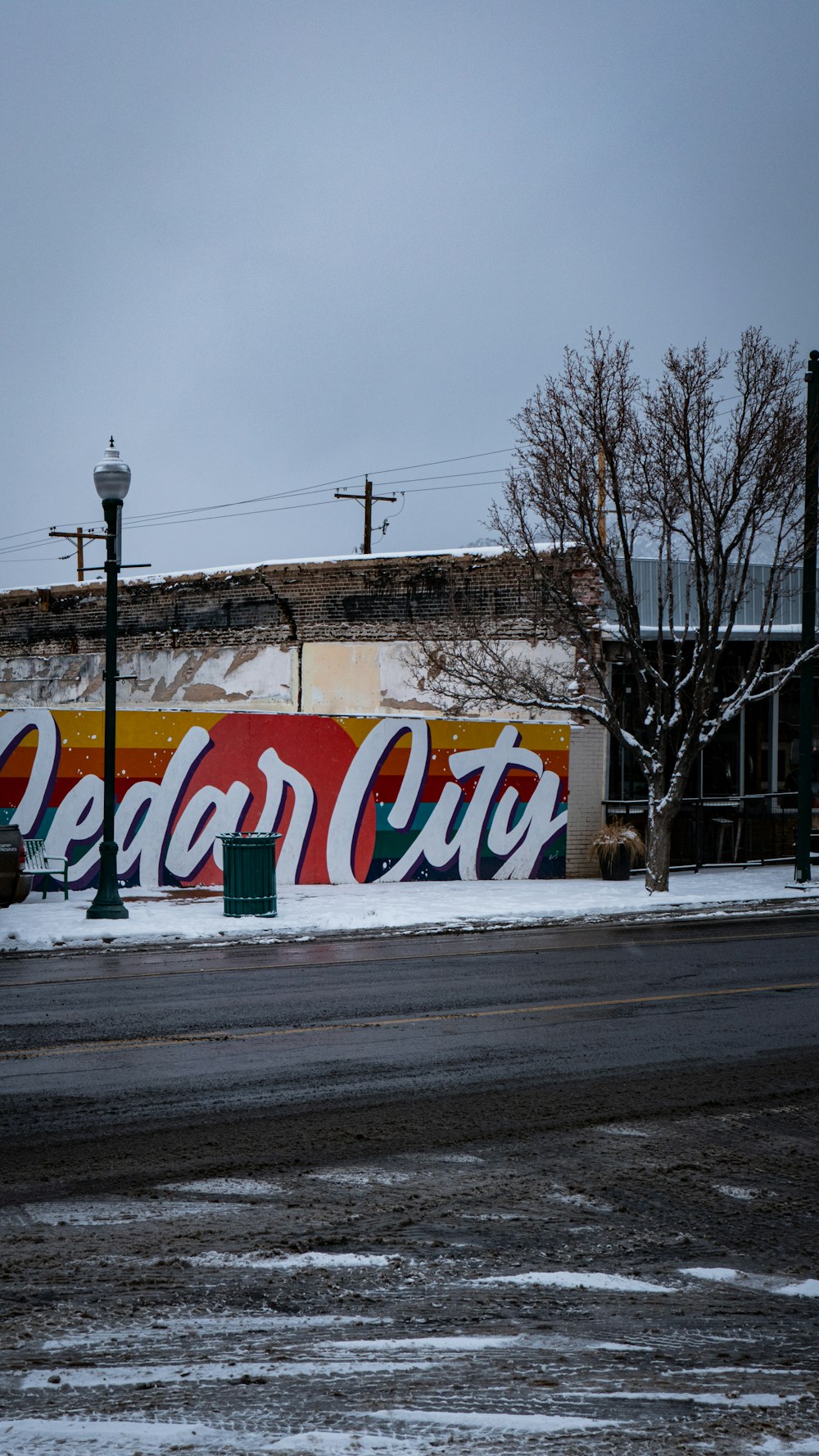 a large coca cola advertisement on the side of a building