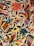 Colorful embroidery featuring birds and flowers with a variety of bright colors. The design includes vibrant hues and intricate details, showcasing a traditional folk art style.