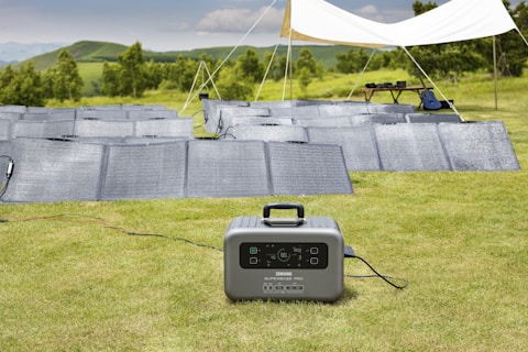 a portable generator in a field of solar panels