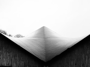 Modern roofing project in Klosters with sharp angular details.