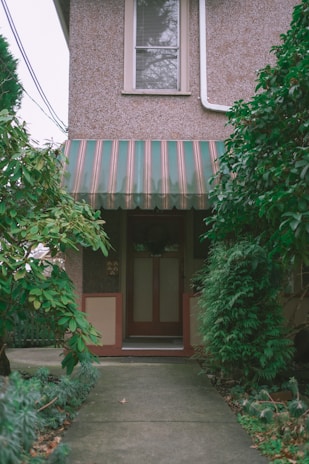 A stylish awning over a doorway, enhancing curb appeal.