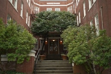 An inviting entrance to the apartment building.