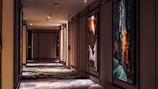 Elegant hallway with soft lighting and tasteful wall art.
