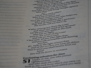 A close-up view of a page with printed text, likely from a book or document. The text is aligned in paragraphs and appears to be religious or philosophical in nature, with references to 'the Lord' and other religious concepts.